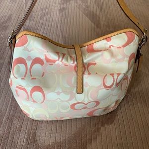 Coach pink and white canvas shoulder bag.